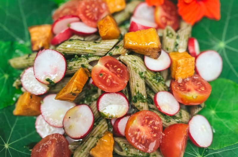 A Midsummer salad with nasturtiums and dandelion pesto pasta