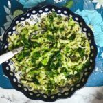 Green slaw with courgette, summer greens and pumpkin seeds with avocado dressing